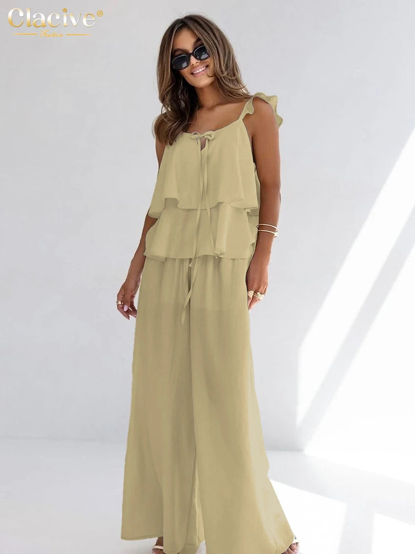 طقم نسائي من قطعتين من القطن الأبيض الفضفاض من Clacive صيفي 2025، مكون من بلوزة بدون أكمام مع بنطلون واسع وخصر مرتفع للنساء