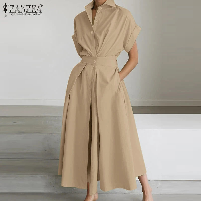 فستان صيفي أنيق بطبعات راقصة وطول ميدي، مثالي للارتداء اليومي والموضة العصرية. 