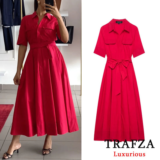 فستان أحمر طويل بحزام وجيوب، تصميم أنيق لربيع صيفي. 