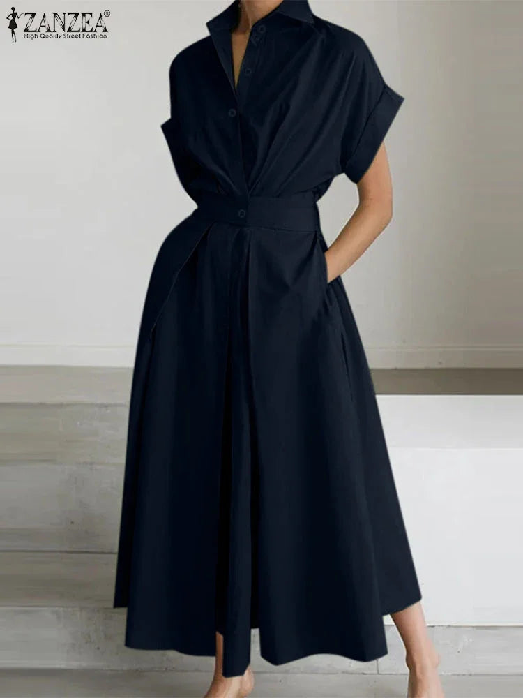 فستان صيفي أنيق بطبعات راقصة وطول ميدي، مثالي للارتداء اليومي والموضة العصرية. 