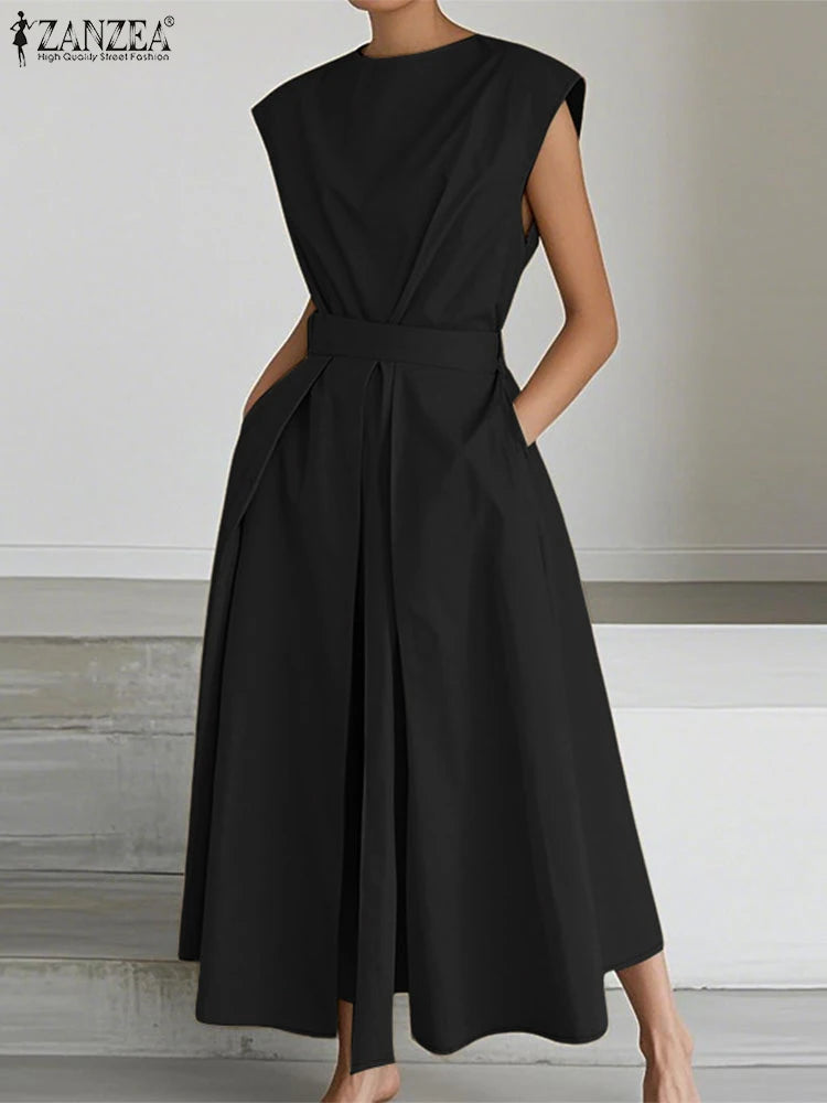 فستان صيفي أنيق بطبعات راقصة وطول ميدي، مثالي للارتداء اليومي والموضة العصرية. 